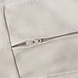 Zippered cushion cover made of textured beige fabric, high-quality zipper visible.