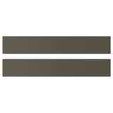 Two HAVSTORP shelves in dark brown/beige. They are rectangular with smooth surfaces and clean lines. Made of acrylic paint and fiberboard.