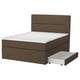 Brown upholstered bed with drawers, white mattress.