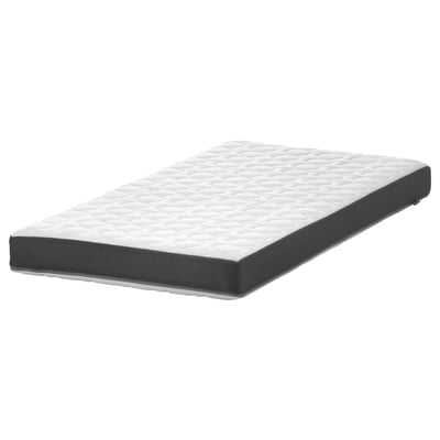 Grey rectangular kids mattress with quilted white top, washable cover.