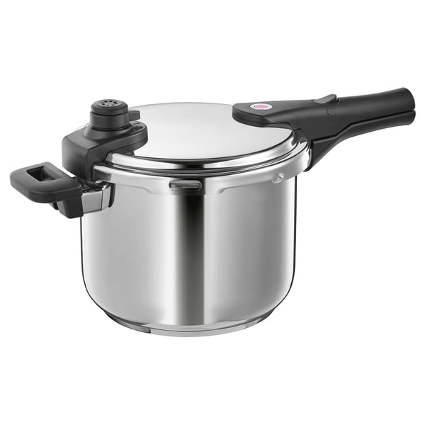 A silver IKEA 365+ pressure cooker with black handles and steam release valve. Its cylindrical with a secure lid.
