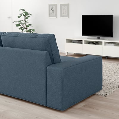 Modern blue KIVIK sofa with tv.