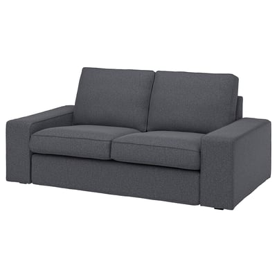 The KIVIK sofa has dark grey fabric, a modern boxy shape, and a two-toned melange effect.