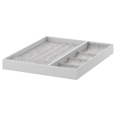 Items: ikea KOMPLEMENT jewelry organizer. Material: felt, fiberboard. Color: gray. Shape: rectangular. Compartments: multiple sizes.