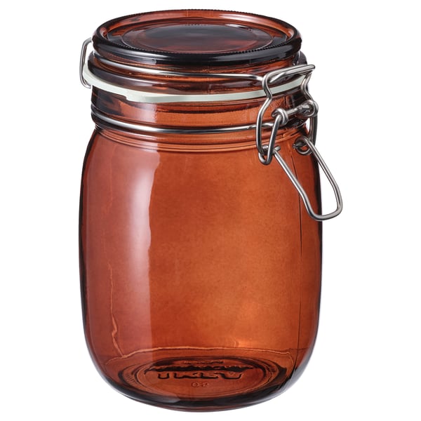 KRÖSAMOS brown glass jar with wire clamp lid, square shape, glossy finish.