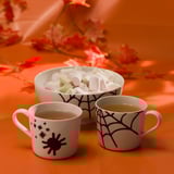 Halloween mugs & marshmallow bowl with flowers.