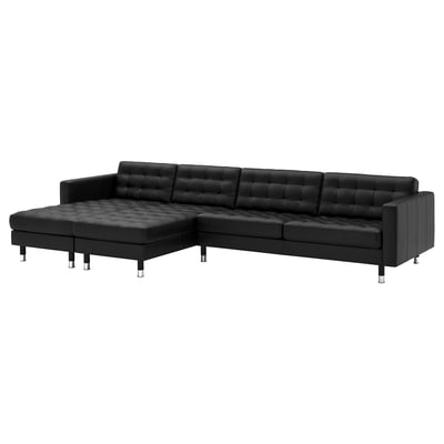 Black leather l-shaped sectional sofa with tufted back and seat cushions, chrome legs.