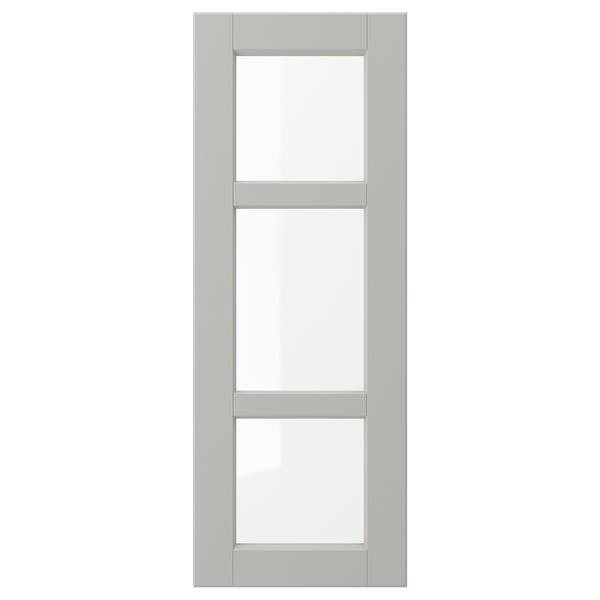 A grey LERHYTTAN kitchen cabinet door with beveled wooden frame and clear glass panels.
