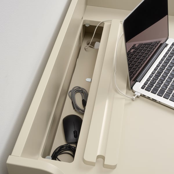 Desk with built-in cable management, keeping cables organized and out of sight.