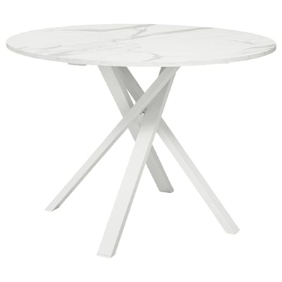 Modern round dining table with white marble top and sturdy metal legs.