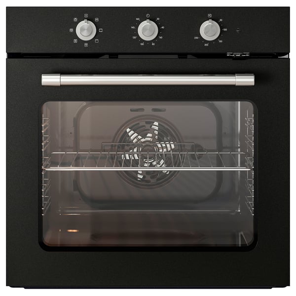 Black built-in oven with silver knobs and handle, digital display, glass door, wire racks inside.