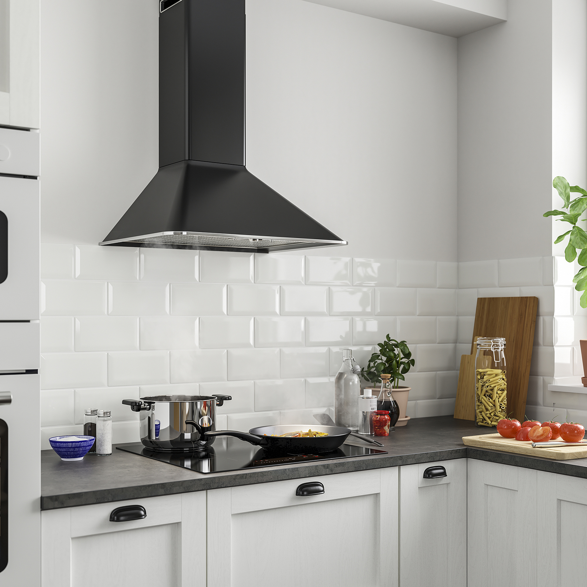 Modern kitchen with MATTRADITION hood, white tiles, grey counters, stainless steel stove, utensils, and plants. Hood dominates above stove.