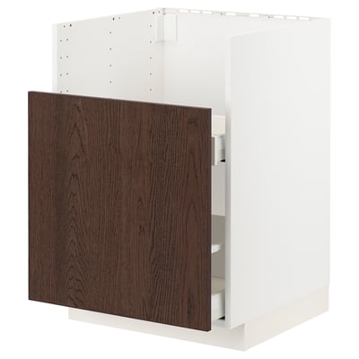 A white METOD kitchen cabinet with dark brown sinarp wooden drawer.