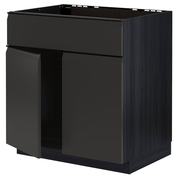 Black METOD kitchen cabinet, dark wood finish, rectangular, glossy edges.