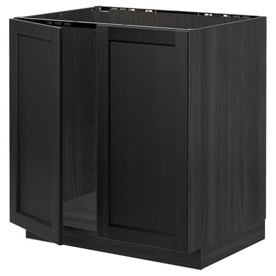 A black METOD kitchen cabinet with beveled edges. Its rectangular, made of wood and two doors.