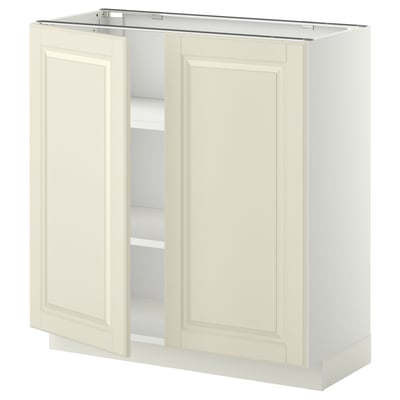 Off-white kitchen cabinet, METOD series, rectangular shape, two doors, bevelled edges, cream color.
