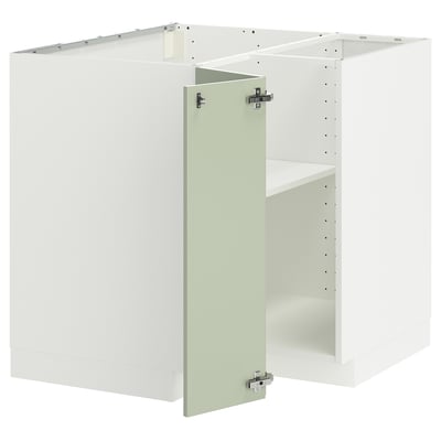 White METOD kitchen cabinet set with green door, hinged.