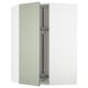 An open off-white METOD kitchen cabinet with green stensund doors and adjustable shelves.