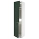A tall, white METOD kitchen cabinet with green havstorp doors, featuring adjustable shelves and a modern, sleek design.