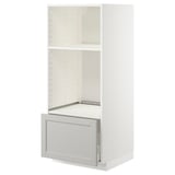 White METOD kitchen cabinet with pull-out drawer and shelves.