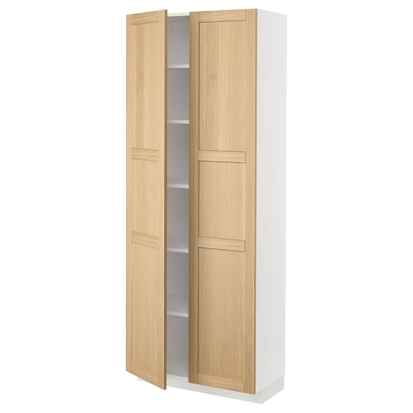 A tall white cabinet with light oak doors. The cabinet multiple shelves and a sleek, modern design.