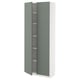 Depicts a white and green kitchen cabinet from the METOD system, featuring an adjustable shelf and a green door.