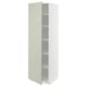 A white METOD kitchen cabinet with a light green stensund door, featuring vertical grooves, and three adjustable shelves inside.