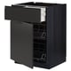Black kitchen cabinet with open drawers and shelves. Modern design with smooth, dark finish.