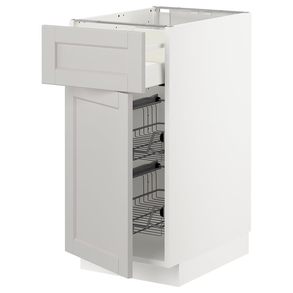 White kitchen cabinet with beveled light grey doors, wire shelves, metal drawer, and wooden construction.