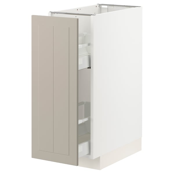 Beige METOD kitchen cabinet with pull-out drawers.