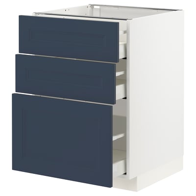 A white kitchen cabinet with three blue drawers. It a modern and timeless design with smooth drawer fronts.
