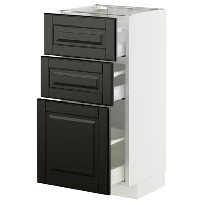 METOD kitchen unit: three black drawers, beveled edges, in white frame.