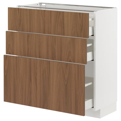 Walnut-colored kitchen unit with three drawers and white sides. Modern, minimalist design. Self-closing drawers.