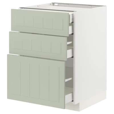 A green METOD kitchen cabinet with drawers in a modern design.