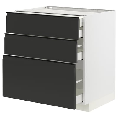 Modern black matte kitchen cabinet with three drawers, integrated handles, sleek design, and smooth surfaces.