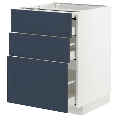 White METOD cabinet with blue drawers, three drawers open, sleek modern design.