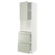 METOD kitchen unit in green with light wood effect drawers and cabinets. Modern, sleek design with soft-closing drawers.
