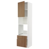 A METOD white kitchen unit with walnut-colored tistorp doors, featuring adjustable shelves and slow-closing drawers.