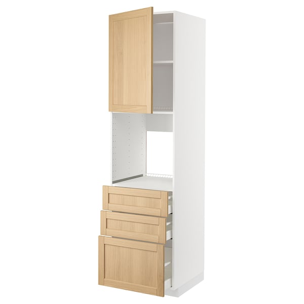 A white METOD kitchen cabinet with light oak veneer doors and drawers. It has a tall frame with a fixed shelf and comes with 25 year guarantee.