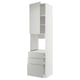 A white METOD kitchen cabinet with light grey drawers, modern design.