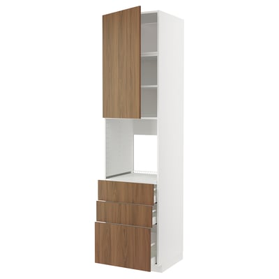 Modern tall kitchen unit with wooden walnut drawers and white frame, mix of materials and sleek design.