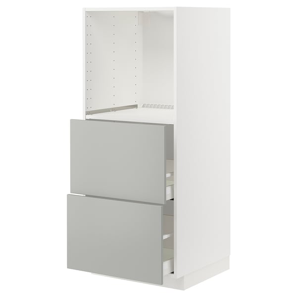 White METOD kitchen cabinet. Light grey drawers, modern design, conceal storage.
