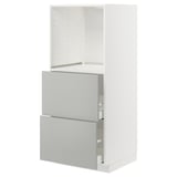 White METOD kitchen cabinet. Light grey drawers, modern design, conceal storage.
