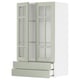 Option: METOD kitchen system. Light green cabinets with glass doors. Modern design for organized storage.