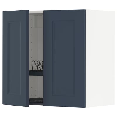 A blue METOD kitchen cabinet with one door open, revealing a wire dish drainer inside.
