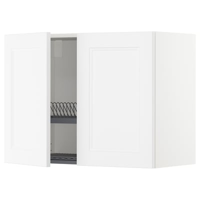 White METOD kitchen cabinet with open door revealing shelves and dish drainer.