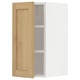 An open light wooden cabinet with two shelves from the METOD kitchen system.