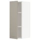 An open beige METOD kitchen cabinet from ikea. It a tall, rectangular shape with two shelves inside.