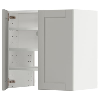 A light grey METOD kitchen cabinet with beveled edges, featuring adjustable shelves and snap-on hinges.