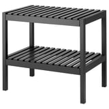 A wooden storage bench named MUSKAN. It is dark grey, rectangular, with two open shelves for storage, suitable for high humidity areas.
